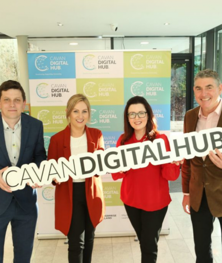 SIRO employees standing with a Cavan Digital Hub sign