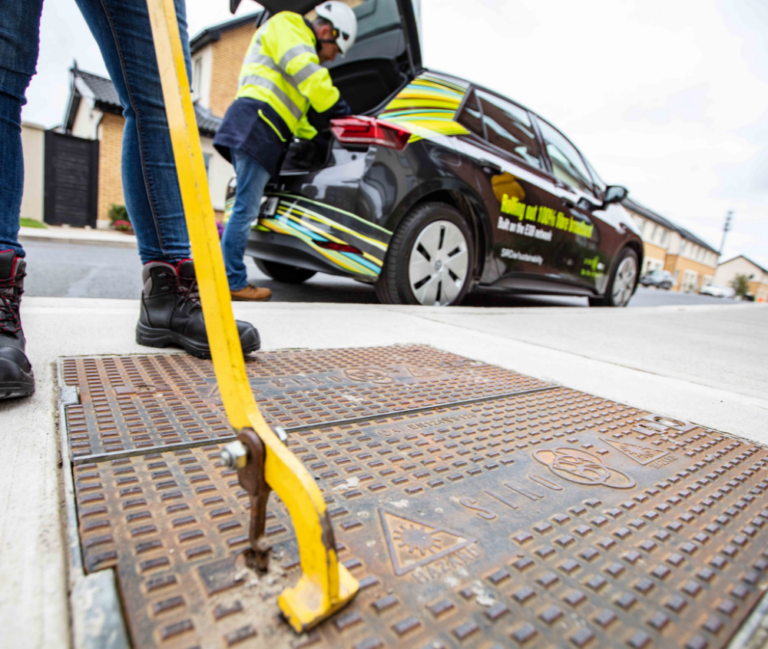 SIRO installation video image of engineer opening up vault